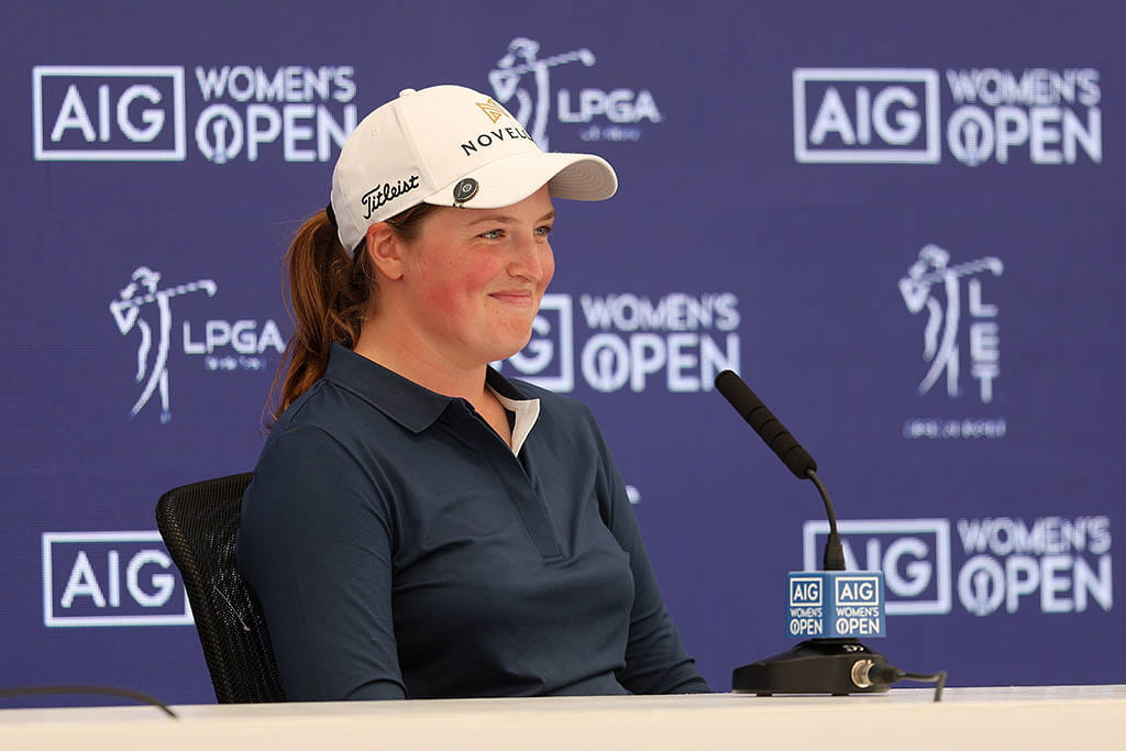 Lottie Woad addresses the media at Royal Porthcawl